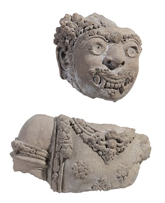 Lot 137 - A MAJAPAHIT FRAGMENTARY TERRACOTTA FIGURE OF A DVARAPALA, CIRCA 14TH C