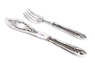 Lot 218 - A PAIR OF VICTORIAN SILVER FISH SERVERS, MARTIN, HALL & CO. LTD., SHEFFIELD, 1875