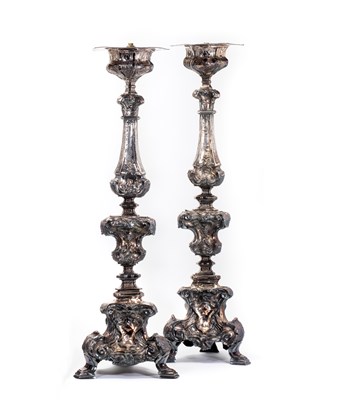 Lot 226 - A PAIR OF SILVERED METAL ALTAR CANDLESTICKS, PROBABLY ITALIAN, MID 18TH