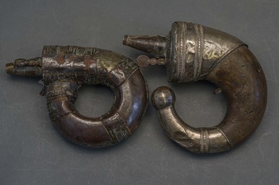 Lot 57 - FOUR ARAB POWDER-FLASKS, 20TH CENTURY