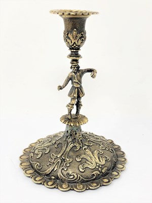 Lot 232 - A CONTINENTAL SILVER-GILT TAPERSTICK, PROBABLY GERMAN, SECOND HALF 19TH CENTURY