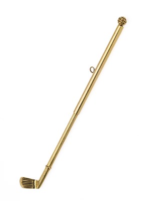 Lot 183 - AN AMERICAN GOLD NOVELTY SWIZZLE STICK, CHERNY, MID 20TH CENTURY