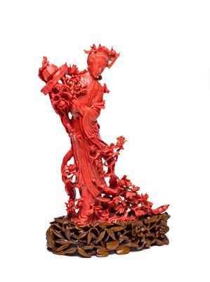 Lot 40 - ËœA CHINESE CORAL FIGURE OF A MAIDEN