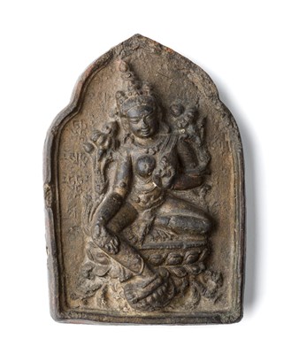 Lot 58 - â“Œ A MOULDED CLAY DEVOTIONAL PLAQUE (TSA-TSA) DEPICTING GREEN TARA