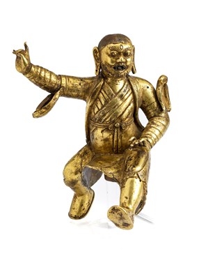 Lot 70 - â“Œ A COPPER GILT FIGURE OF AN ARHAT