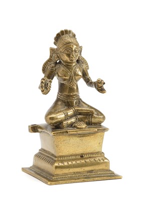 Lot 104 - A CAST BRASS FIGURE OF PARVATI