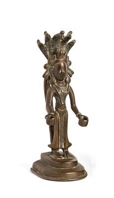 Lot 111 - A BRONZE ATTENDANT FIGURE