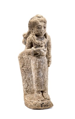 Lot 154 - A VOLCANIC STONE FIGURE OF A FEMALE ATTENDANT