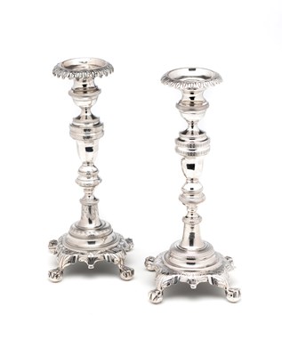 Lot 294 - â“Œ A NEAR PAIR OF BRAZILIAN SILVER CANDLESTICKS