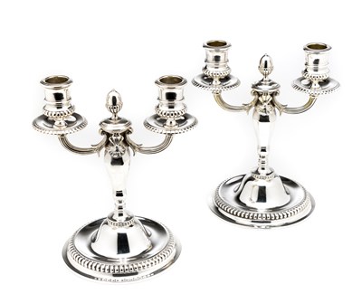 Lot 325 - â“Œ A PAIR OF VICTORIAN SILVER CANDELABRA