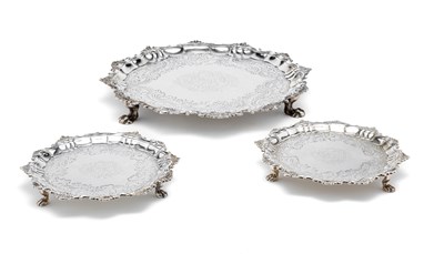 Lot 352 - A SET OF THREE GEORGE II SILVER SALVERS