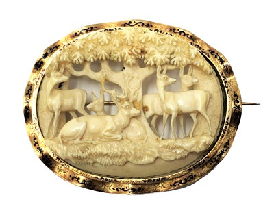 Lot 466 - Ëœâ’¼ A GOLD BROOCH MOUNTED IVORY PANEL