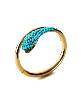 Lot 493 - TURQUOISE AND GARNET SERPENT BANGLE