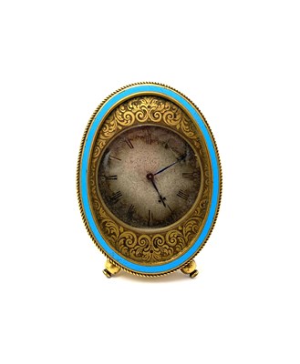 Lot 262 - A VICTORIAN GILT-BRASS SMALL STRUT CLOCK, RETAILED BY HENRY RODRIGUES, LONDON, CIRCA 1868