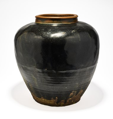 Lot 217 - A CHINESE BLACK-GLAZED STONEWARE LOBED JAR, PROBABLY MING DYNASTY, 16TH/17TH CENTURY