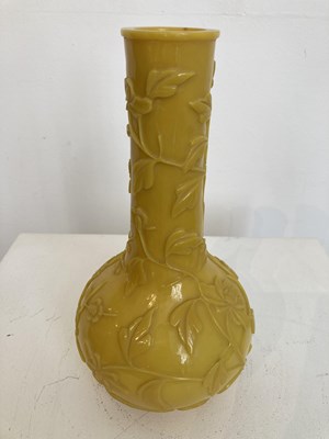 Lot 91 - A CHINESE CARVED OPAQUE LEMON-YELLOW GLASS BOTTLE VASE, LATE QING DYNASTY, 19TH CENTURY