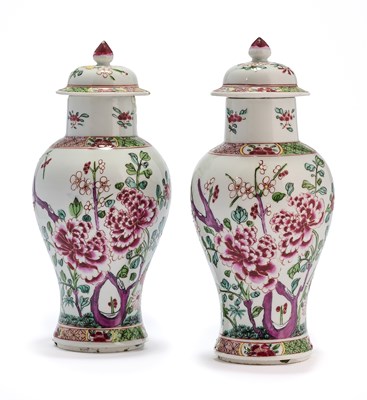 Lot 64 - A PAIR OF CHINESE FAMILLE-ROSE BALUSTER VASES AND COVERS
