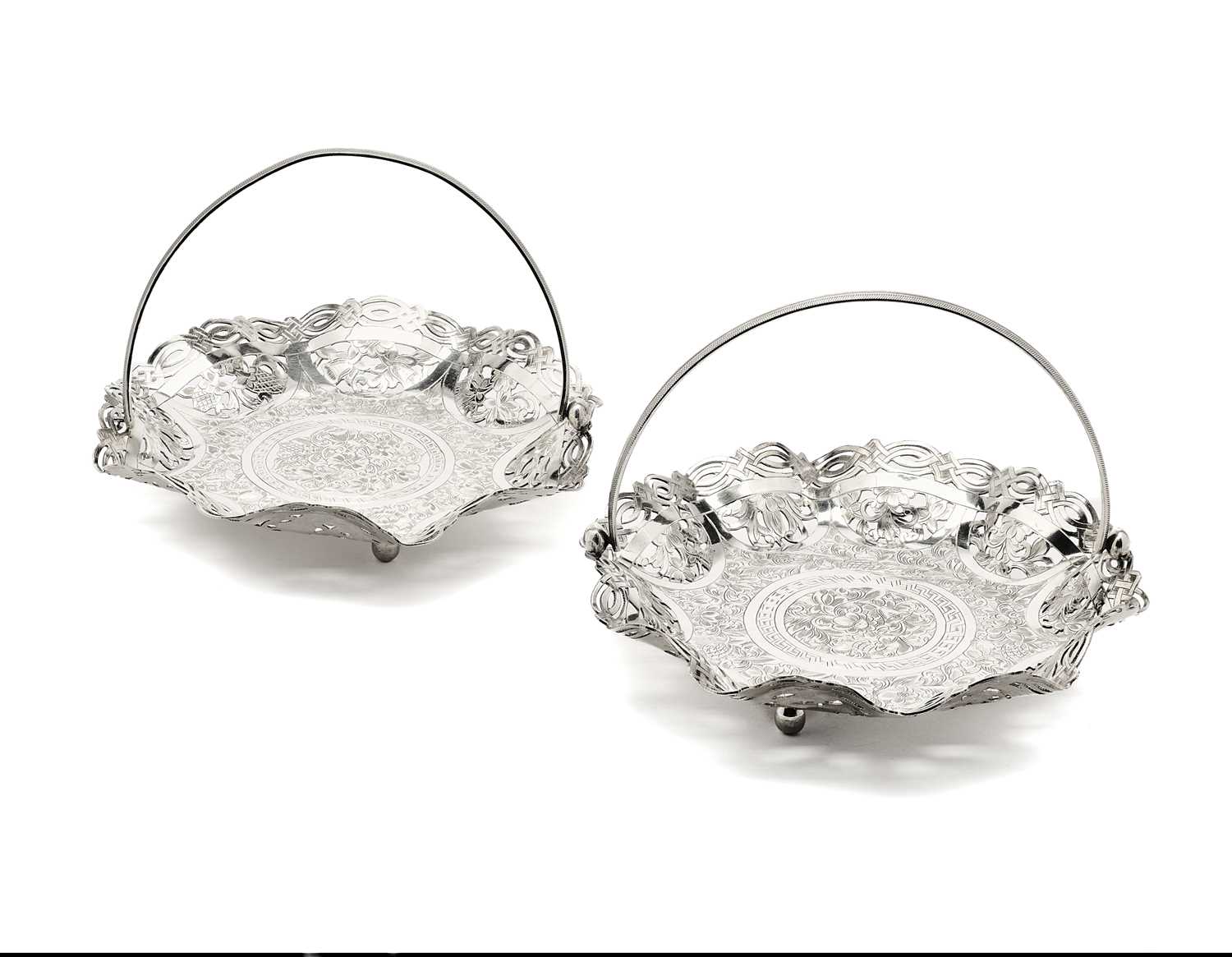 Lot 62 - A PAIR OF IRANI SWEETMEAT BASKETS, PROBABLY ISFAHAN, 20TH CENTURY