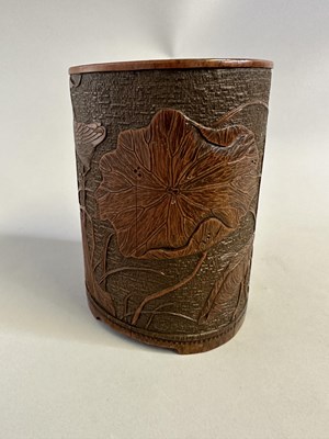 Lot 94 - A CHINESE CARVED BAMBOO 'LOTUS POND' BRUSH POT, BITONG, QING DYNASTY, 18TH CENTURY