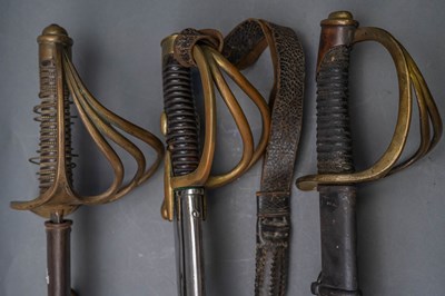 Lot 93 - A FRENCH MODEL 1822 CAVALRY SWORD, 19TH CENTURY; A SWORD IN FRENCH AN XI STYLE AND ANOTHER, 20TH CENTURY