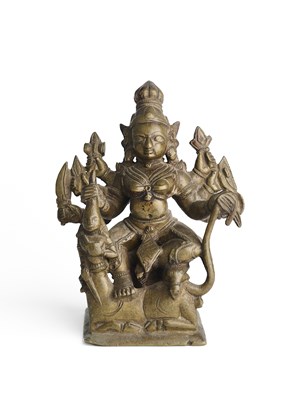 Lot 133 - A BRONZE FIGURE OF DURGA SLAYING THE BUFFALO DEMON, DECCAN, 18TH CENTURY