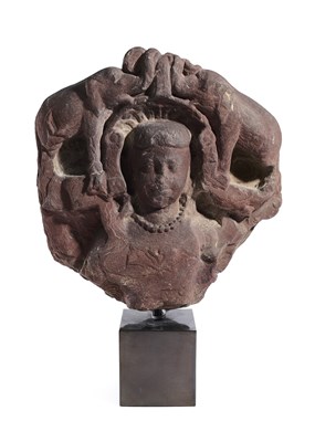 Lot 202 - A KUSHAN PINK SANDSTONE FRAGMENT DEPICTING GAJALAKSHMI, NORTHERN INDIA, 3RD/4TH CENTURY