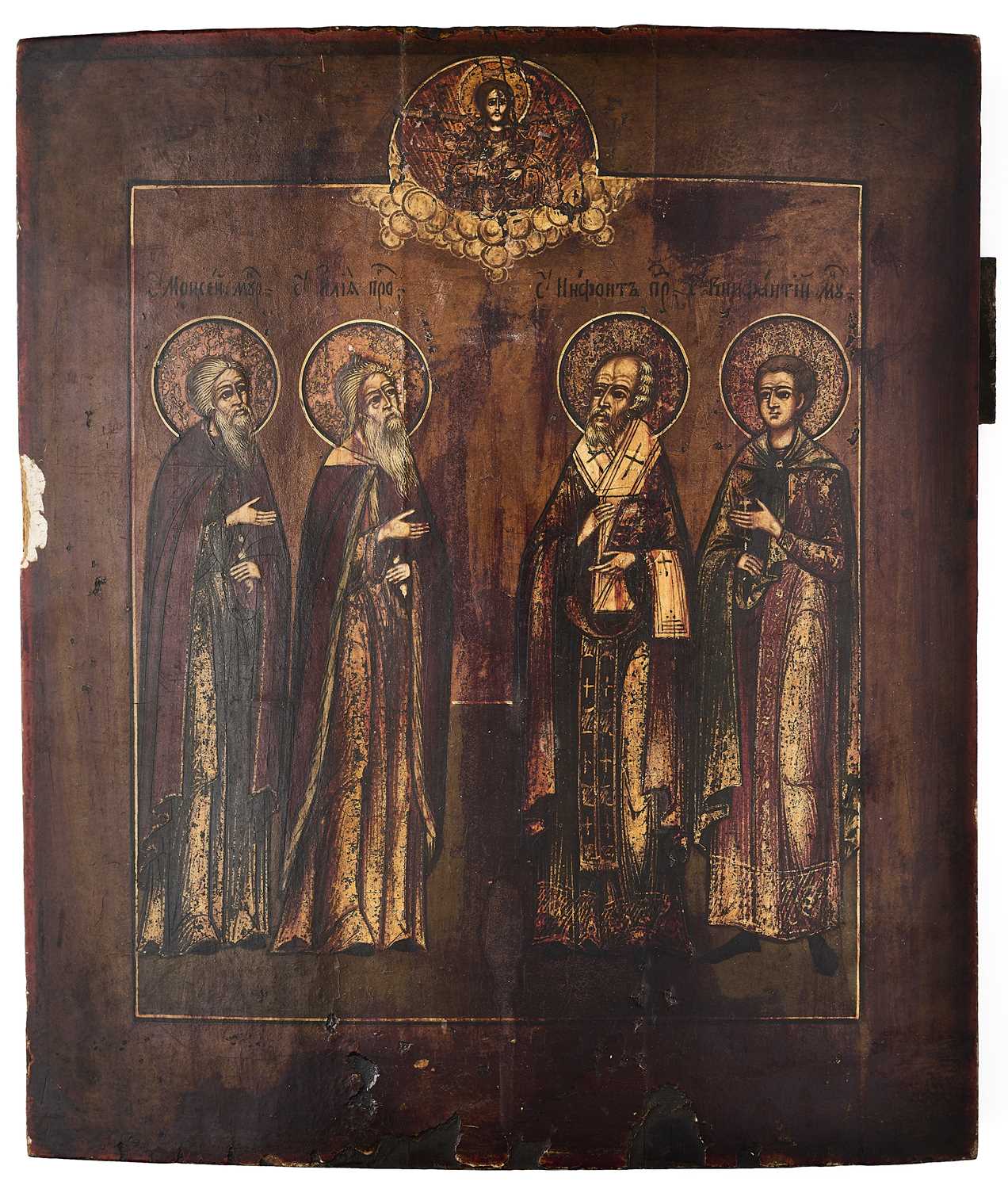 Lot 39 - AN ICON OF MOSES, ELIJAH, SAINT NIPHONT AND SAINT PANTELEIMON, RUSSIAN, LATE 18TH / EARLY 19TH CENTURY