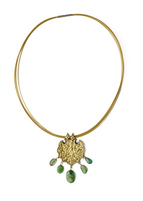 Lot 281 - A GOLD REPOUSSE PENDANT, RAJASTHAN, INDIA, 19TH/20TH CENTURY