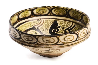 Lot 85 - A NISHAPUR SLIP PAINTED POTTERY BOWL, PERSIA, 10TH CENTURY