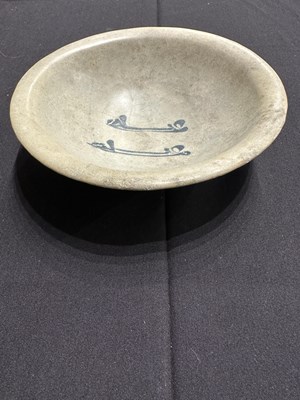Lot 86 - AN ABBASID TIN GLAZED POTTERY BOWL, MESOPOTAMIA, CIRCA 9TH CENTURY