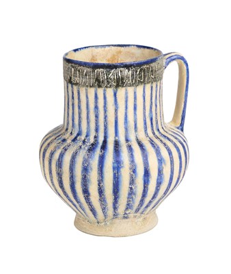 Lot 90 - A KASHAN BLUE AND WHITE JUG, PERSIA, 13TH CENTURY