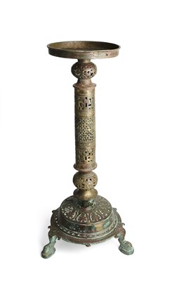 Lot 94 - A KHORASAN BRONZE LAMP HOLDER, EASTERN IRAN OR AFGHANISTAN, CIRCA 11TH CENTURY AND LATER