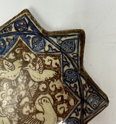 Lot 51 - A KASHAN LUSTRE STAR TILE, PERSIA, 14TH CENTURY
