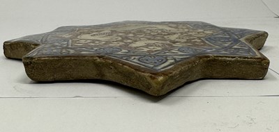 Lot 51 - A KASHAN LUSTRE STAR TILE, PERSIA, 14TH CENTURY