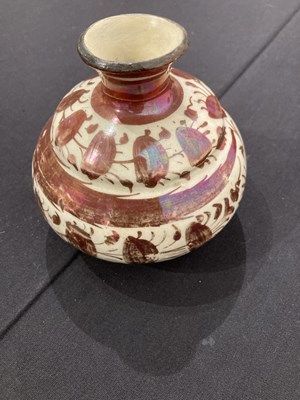 Lot 528 - A SAFAVID LUSTRE PAINTED POTTERY BOTTLE, PERSIA, 17TH CENTURY
