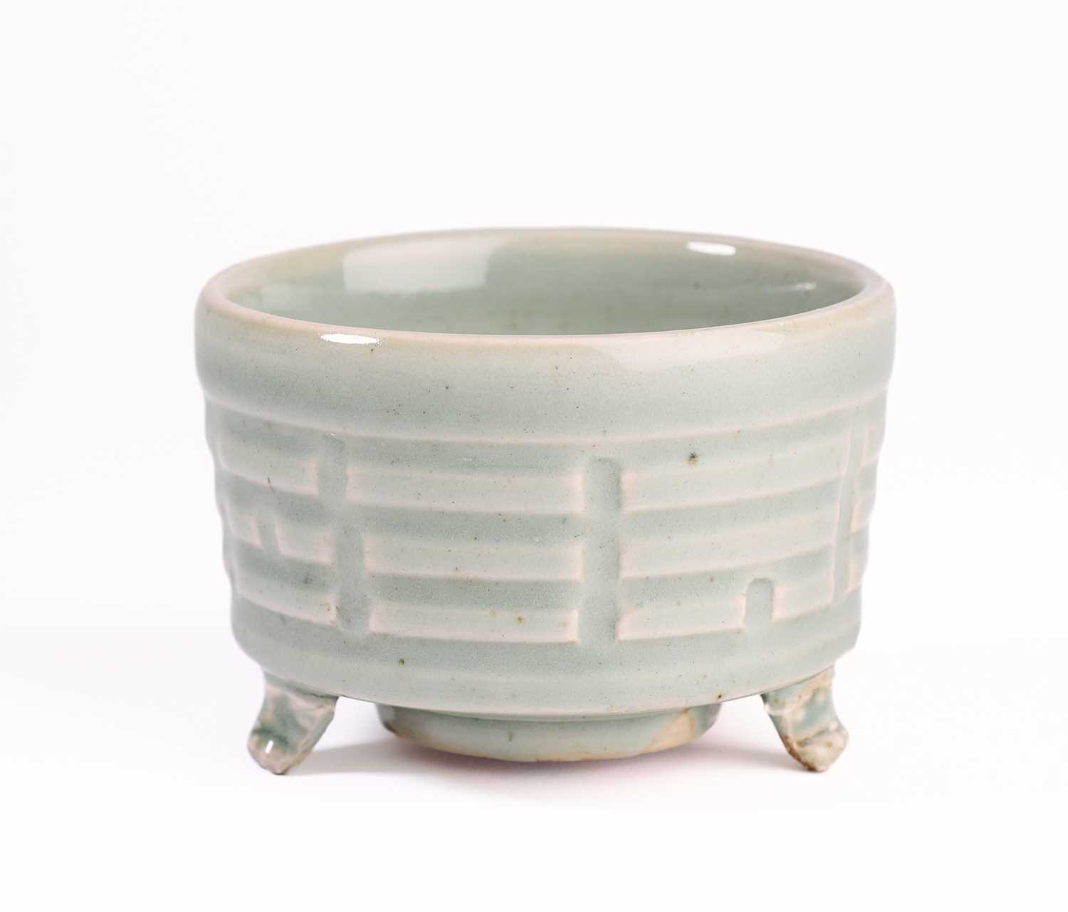Lot 60 - A CHINESE LONGQUAN CELADON 'TRIGRAM' CENSER