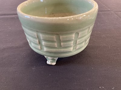Lot 60 - A CHINESE LONGQUAN CELADON 'TRIGRAM' CENSER