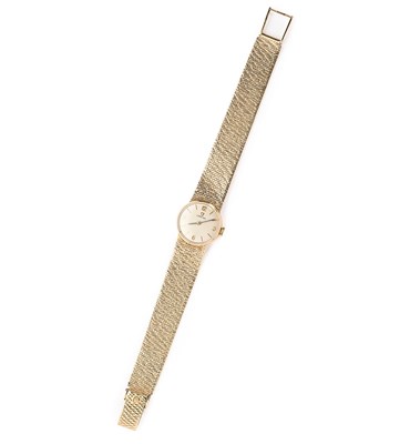 Lot 163 - OMEGA: A LADY'S GOLD BRACELET WATCH, CIRCA 1965