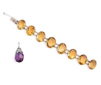 Lot 460 - VICTORIAN SILVER AND CITRINE BRACELET, 1867 AND AMETHYST PENDANT, 1930s