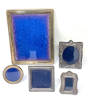 Lot 111 - FIVE SILVER-MOUNTED PHOTOGRAPH FRAMES, 20TH CENTURY