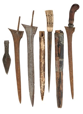 Lot 25 - FIVE MALAYSIAN DAGGERS (KRIS), A DAGGER AND TWO SPEARHEADS, 19TH CENTURY