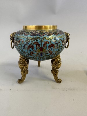 Lot 28 - A CHINESE GILT-BRONZE AND CLOISONNE ENAMEL TRIPOD CENSER AND COVER, QING DYNASTY, QIANLONG PERIOD (1736-95)