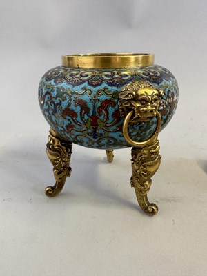 Lot 28 - A CHINESE GILT-BRONZE AND CLOISONNE ENAMEL TRIPOD CENSER AND COVER, QING DYNASTY, QIANLONG PERIOD (1736-95)