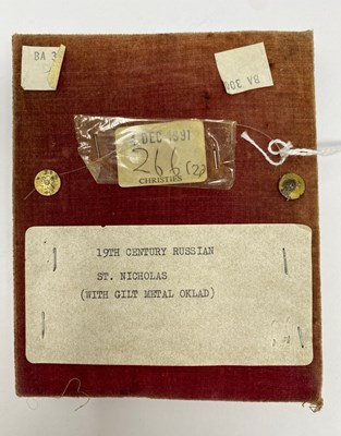 Lot 36 - A RUSSIAN ICON OF SAINT NICHOLAS THE WONDERWORKER WITH SILVER-GILT OKLAD, IVAN TARABROV, MOSCOW, LATE 19TH CENTURY