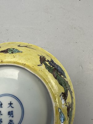 Lot 16 - A CHINESE FAMILLE-NOIR 'DRAGON' DISH, KANGXI PERIOD (1662-1722)