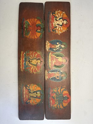 Lot 170 - A PAIR OF PAINTED WOOD BOOKCOVERS, TIBET, 15TH/16TH CENTURY