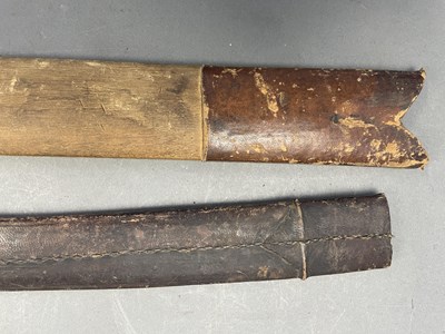 Lot 26 - A DETACHED BLADE FROM A MALAYSIAN DAGGER (KRIS), AN INDIAN SILVER CHAPE FROM A SCABBARD, A KATAR SCABBARD AND SEVEN ASIAN SWORD SCABBARDS, 19TH/EARLY 20TH CENTURIES