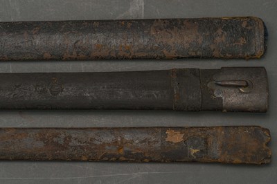 Lot 127 - THREE LEATHER-COVERED WOODEN SCABBARDS, LATE 17TH AND 18TH CENTURIES