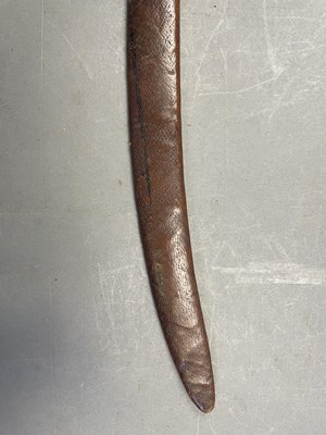 Lot 127 - THREE LEATHER-COVERED WOODEN SCABBARDS, LATE 17TH AND 18TH CENTURIES