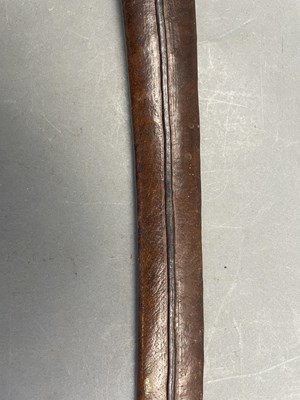 Lot 127 - THREE LEATHER-COVERED WOODEN SCABBARDS, LATE 17TH AND 18TH CENTURIES